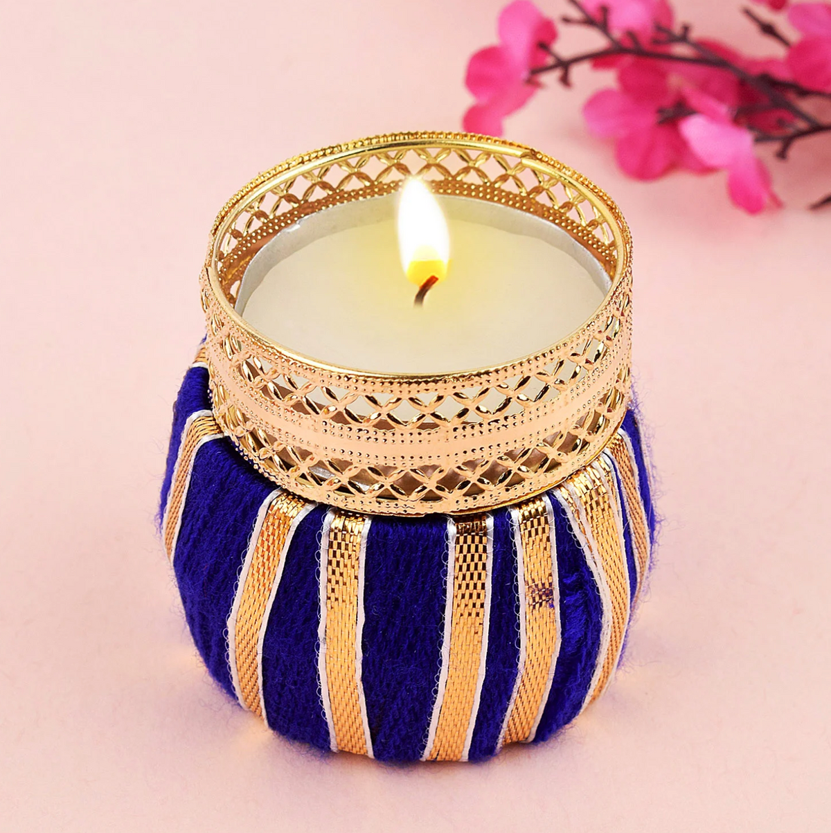 Classic fire pots in golden finish placed neatly for festive home décor