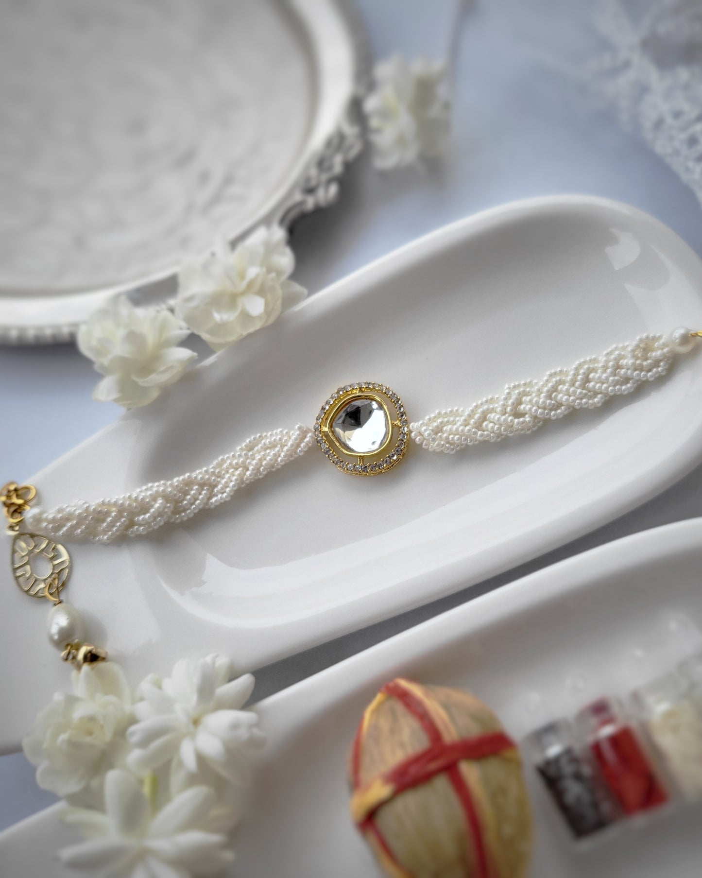 Polki Diamond Rakhi with Pearls