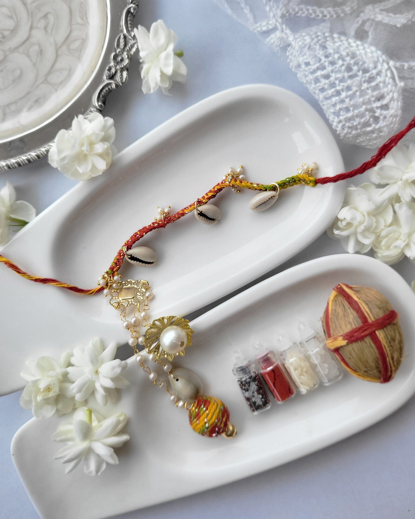 Pearl + Cowries in Mauli Dhaga Lumba Rakhi