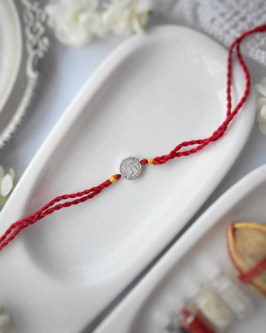 Swastik Silver Rakhi with Studded Stones